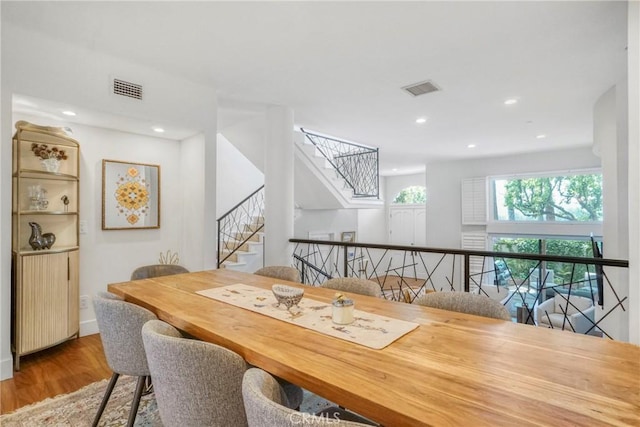 2311 Roscomare Rd Unit 16, Los Angeles, CA 90077 - dining room featuring wood finished floors, recessed lighting, and stairs