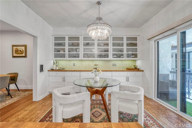 2311 Roscomare Rd Unit 16, Los Angeles, CA 90077 - dining space featuring a chandelier