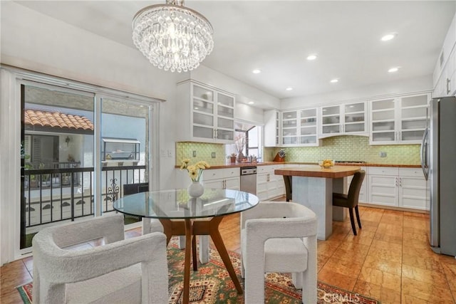 2311 Roscomare Rd Unit 16, Los Angeles, CA 90077 - dining area featuring a chandelier and recessed lighting