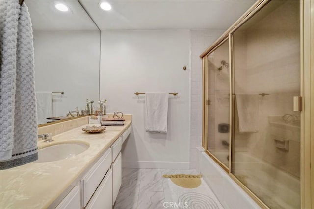 2311 Roscomare Rd Unit 16, Los Angeles, CA 90077 - full bathroom featuring vanity, recessed lighting, shower / bath combination with glass door, and marble finish floors