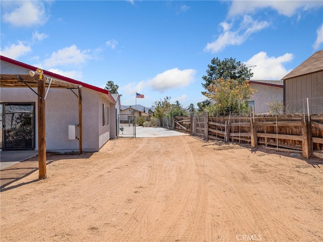14060 Osage Rd, Apple Valley, CA 92307 - view of yard with a gate and fence