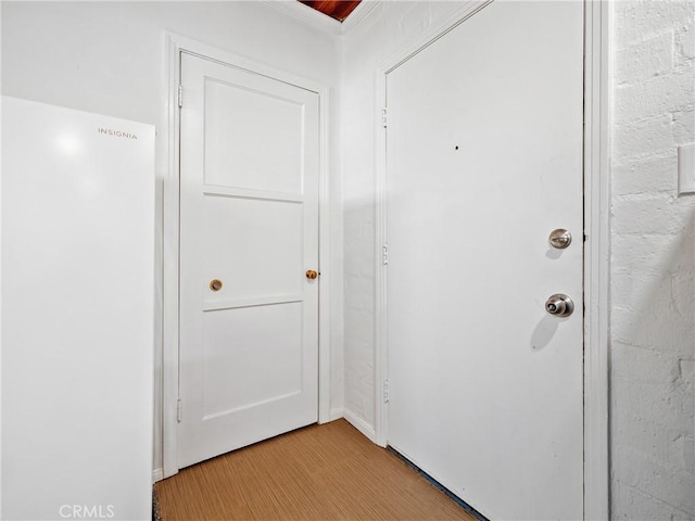 14060 Osage Rd, Apple Valley, CA 92307 - doorway featuring light wood finished floors