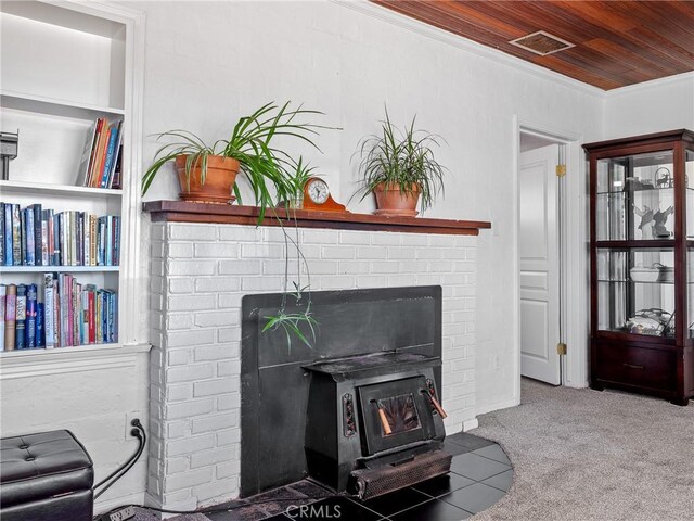 14060 Osage Rd, Apple Valley, CA 92307 - living area featuring a fireplace, carpet flooring, ornamental molding, wooden ceiling, and built in features