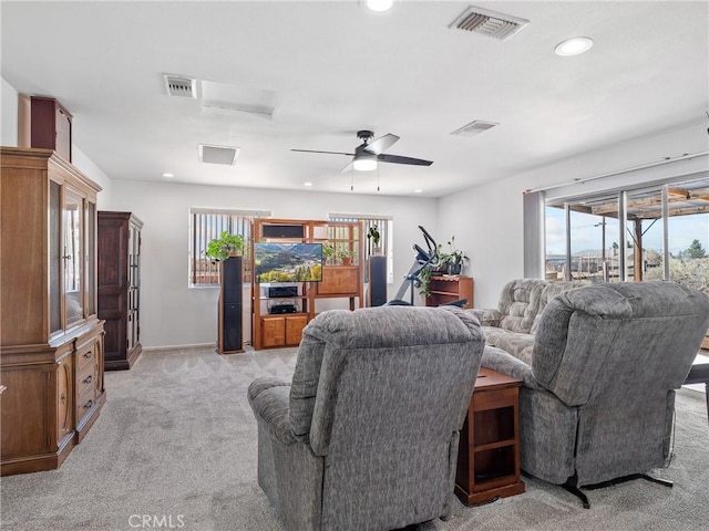 14060 Osage Rd, Apple Valley, CA 92307 - living room with light carpet, recessed lighting, healthy amount of natural light, ceiling fan, and baseboards