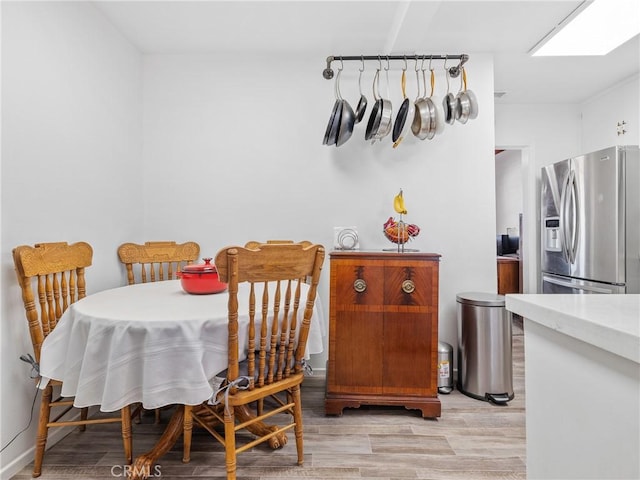 14060 Osage Rd, Apple Valley, CA 92307 - dining area with light wood finished floors
