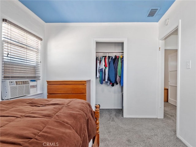 14060 Osage Rd, Apple Valley, CA 92307 - carpeted bedroom with a closet, ornamental molding, a walk in closet, baseboards, and cooling unit