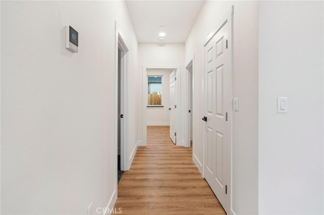 6296 Diamond Ave, Paradise, CA 95969 - hallway with light wood-style floors and baseboards