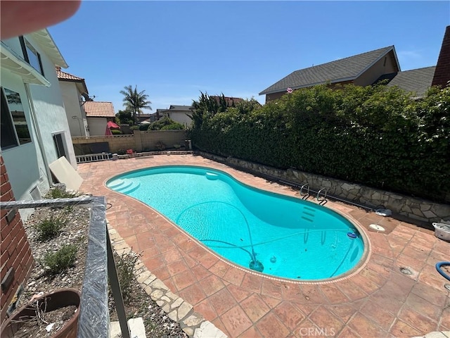 990 244th St, Harbor City, CA 90710 - view of swimming pool featuring a patio area and a fenced backyard
