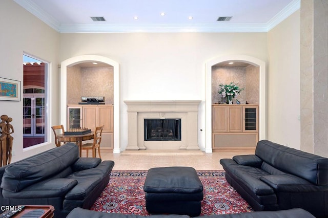 1690 Calle Tierra Vis, Camarillo, CA 93010 - living room with crown molding, arched walkways, a high end fireplace, and recessed lighting