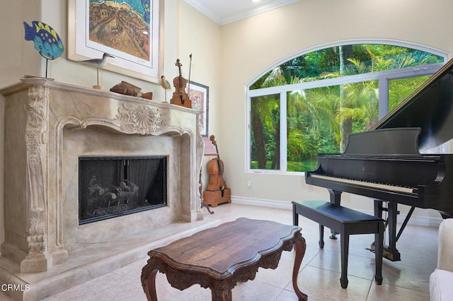 1690 Calle Tierra Vis, Camarillo, CA 93010 - living area featuring crown molding, a premium fireplace, tile patterned floors, and baseboards