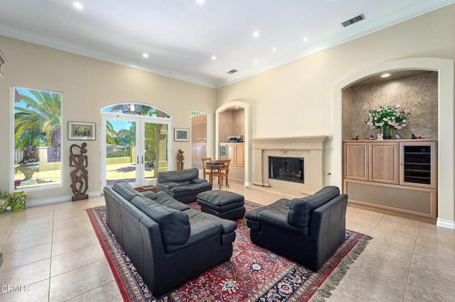 1690 Calle Tierra Vis, Camarillo, CA 93010 - living area with light tile patterned floors, crown molding, recessed lighting, french doors, and a high end fireplace