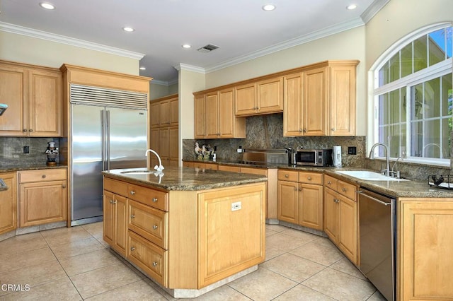 1690 Calle Tierra Vis, Camarillo, CA 93010 - kitchen featuring stainless steel appliances, a sink, light tile patterned floors, tasteful backsplash, and recessed lighting