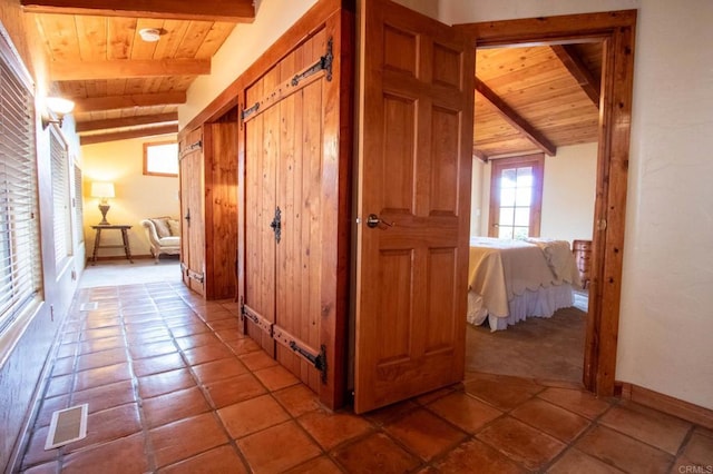 11105 Berry Rd, Valley Center, CA 92082 - hallway with wood ceiling and light tile patterned floors