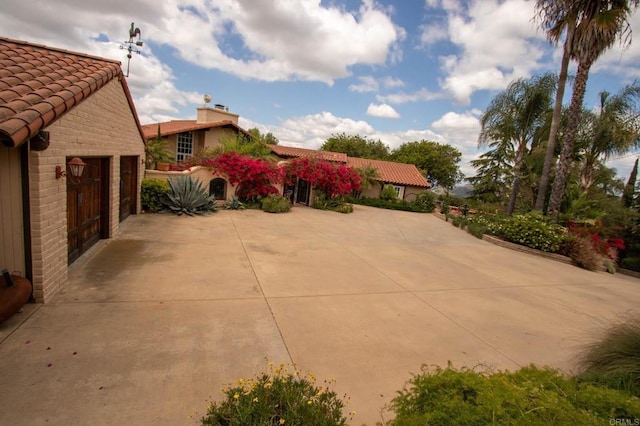 11105 Berry Rd, Valley Center, CA 92082 - view of patio featuring a garage