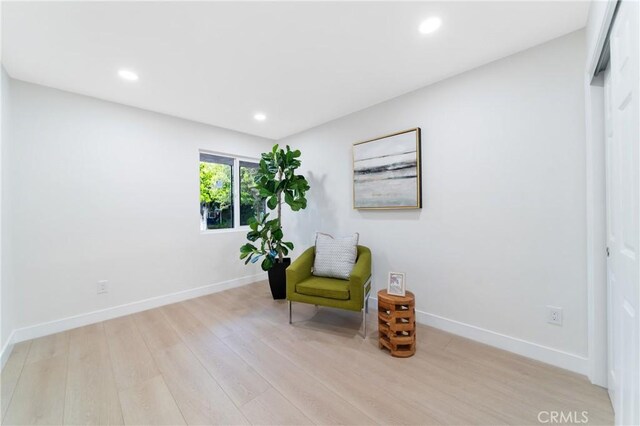 3445 Tilden Ave, Los Angeles, CA 90034 - living area with light wood-style flooring, baseboards, and recessed lighting