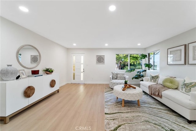 3445 Tilden Ave, Los Angeles, CA 90034 - living area with light wood finished floors, recessed lighting, and baseboards