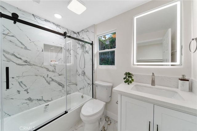 3445 Tilden Ave, Los Angeles, CA 90034 - full bathroom featuring marble finish flooring, toilet, vanity, enclosed tub / shower combo, and baseboards
