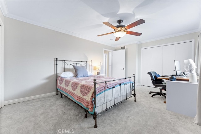 1121 E 1st St, Tustin, CA 92780 - carpeted bedroom with ornamental molding, baseboards, a closet, an office area, and a ceiling fan