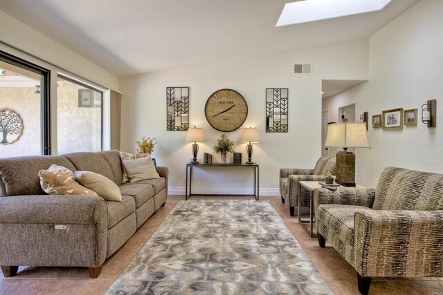 3749 Sarah Ann Dr, Fallbrook, CA 92028 - living area featuring a skylight and lofted ceiling