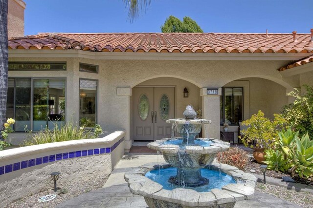 3749 Sarah Ann Dr, Fallbrook, CA 92028 - property entrance featuring a tile roof and stucco siding