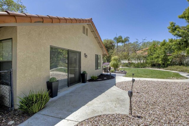 3749 Sarah Ann Dr, Fallbrook, CA 92028 - view of side of property with a patio area and stucco siding