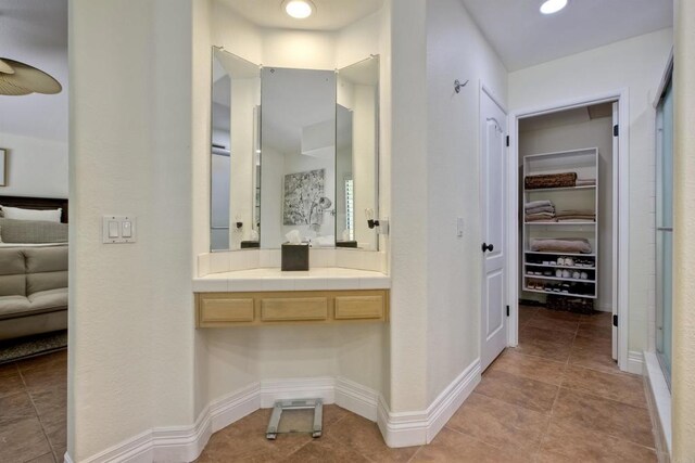 3749 Sarah Ann Dr, Fallbrook, CA 92028 - bathroom with a spacious closet, tile patterned floors, a shower with shower door, and vanity