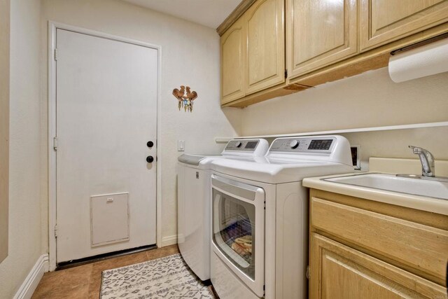 3749 Sarah Ann Dr, Fallbrook, CA 92028 - laundry room featuring independent washer and dryer, cabinet space, baseboards, and light tile patterned flooring