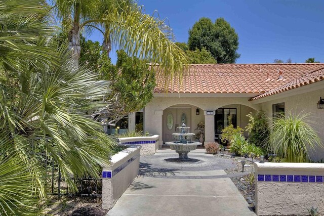 3749 Sarah Ann Dr, Fallbrook, CA 92028 - rear view of property featuring stucco siding and a tile roof