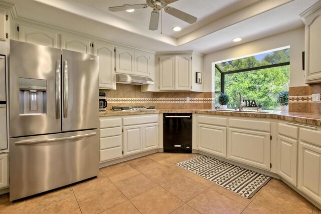 3749 Sarah Ann Dr, Fallbrook, CA 92028 - kitchen with appliances with stainless steel finishes, decorative backsplash, recessed lighting, ceiling fan, and light tile patterned floors