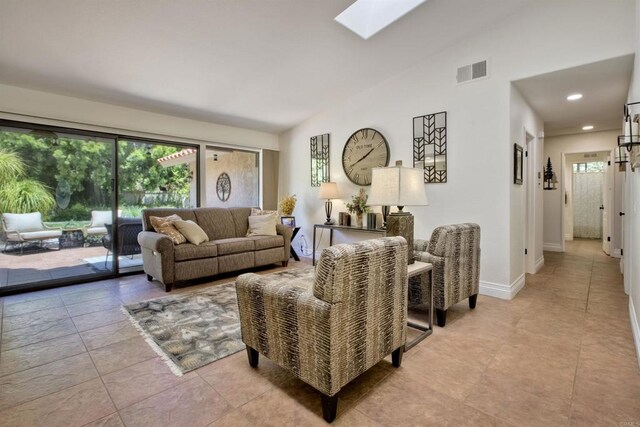 3749 Sarah Ann Dr, Fallbrook, CA 92028 - living area with lofted ceiling, a skylight, baseboards, and recessed lighting