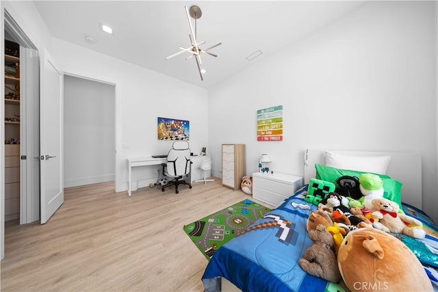 1270 W Chase Dr, Corona, CA 92882 - bedroom featuring wood finished floors, ceiling fan, a chandelier, baseboards, and vaulted ceiling