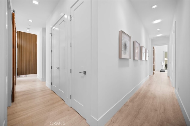 1270 W Chase Dr, Corona, CA 92882 - hallway featuring light wood-type flooring and baseboards