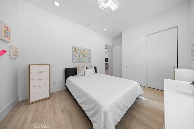1270 W Chase Dr, Corona, CA 92882 - bedroom with wood finished floors, a closet, and baseboards