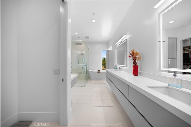 1270 W Chase Dr, Corona, CA 92882 - full bathroom with a shower stall, double vanity, a walk in closet, and tile patterned flooring
