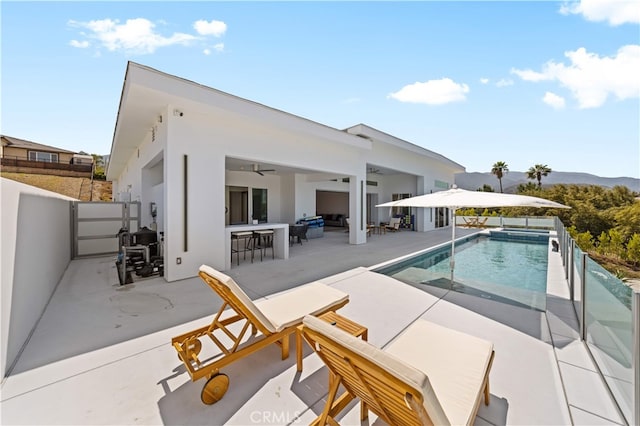 1270 W Chase Dr, Corona, CA 92882 - view of pool with a patio area, ceiling fan, and a pool with connected hot tub