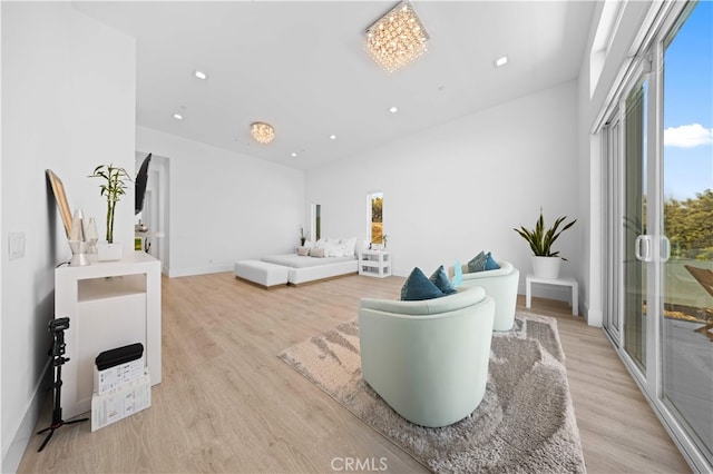 1270 W Chase Dr, Corona, CA 92882 - living room with recessed lighting, light wood-style floors, baseboards, and a towering ceiling