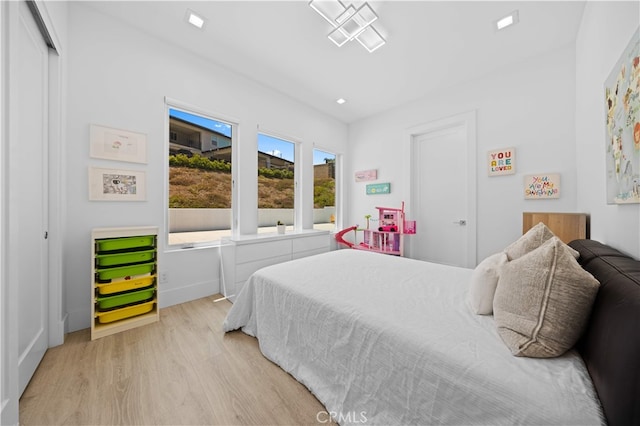 1270 W Chase Dr, Corona, CA 92882 - bedroom featuring light wood-style flooring and baseboards