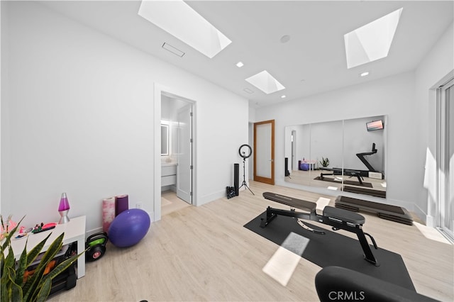 1270 W Chase Dr, Corona, CA 92882 - exercise area featuring a skylight, light wood finished floors, recessed lighting, and baseboards