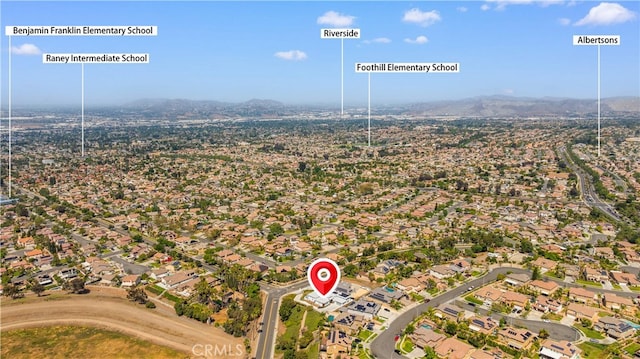 1270 W Chase Dr, Corona, CA 92882 - aerial view of property's location with a mountain backdrop and nearby suburban area