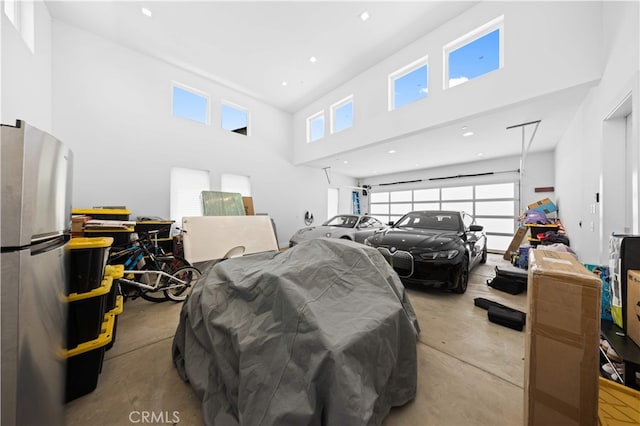 1270 W Chase Dr, Corona, CA 92882 - garage with recessed lighting and freestanding refrigerator