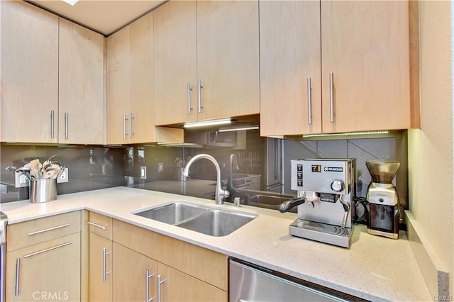 133 The Promenade N Unit 408, Long Beach, CA 90802 - kitchen with light brown cabinets, a sink, light stone countertops, and decorative backsplash