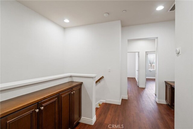 30505 Canyon Hills Rd Unit 1205, Lake Elsinore, CA 92532 - hallway featuring an upstairs landing, dark wood finished floors, baseboards, and recessed lighting