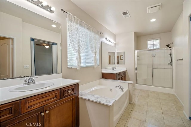 30505 Canyon Hills Rd Unit 1205, Lake Elsinore, CA 92532 - bathroom with a shower stall, vanity, a bath, tile patterned flooring, and a ceiling fan