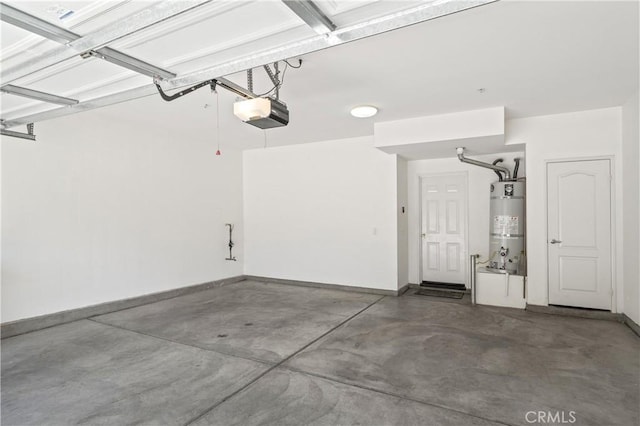 30505 Canyon Hills Rd Unit 1205, Lake Elsinore, CA 92532 - garage with water heater, a garage door opener, and baseboards