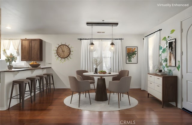 30505 Canyon Hills Rd Unit 1205, Lake Elsinore, CA 92532 - dining area with dark wood-style floors and baseboards