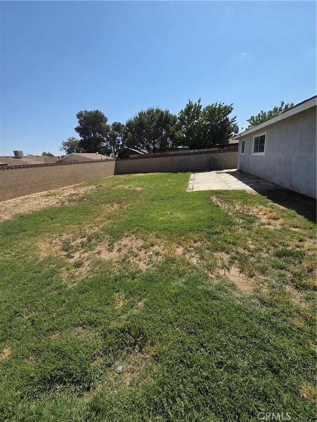 355 Woodlark St, Lancaster, CA 93535 - view of yard with a patio area