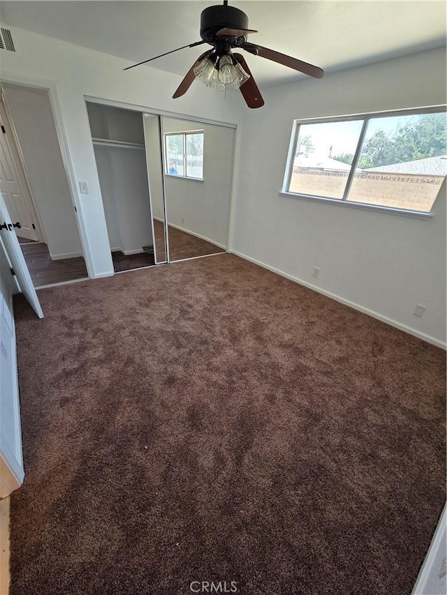 355 Woodlark St, Lancaster, CA 93535 - unfurnished bedroom with carpet, baseboards, a ceiling fan, and a closet
