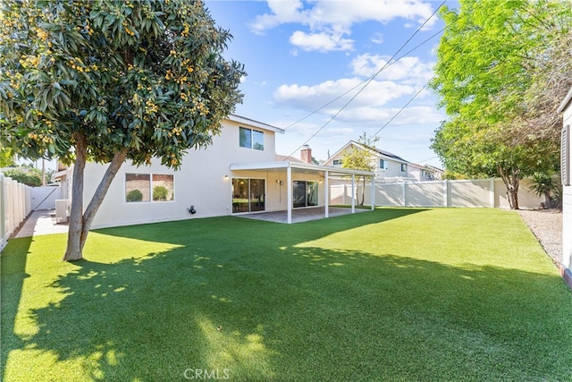 13421 Epping Way, Tustin, CA 92780 - back of house featuring stucco siding and a patio area