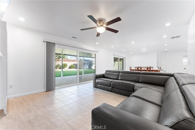 13421 Epping Way, Tustin, CA 92780 - living area featuring ceiling fan, recessed lighting, light tile patterned flooring, baseboards, and stairway