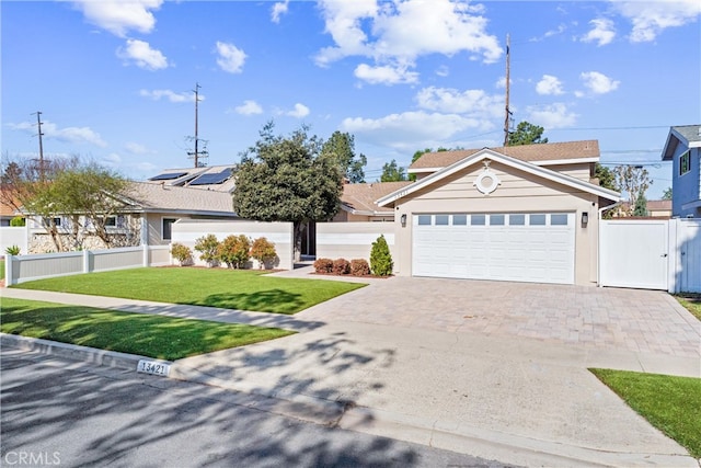 13421 Epping Way, Tustin, CA 92780 - view of front of home featuring driveway, a gate, and a garage